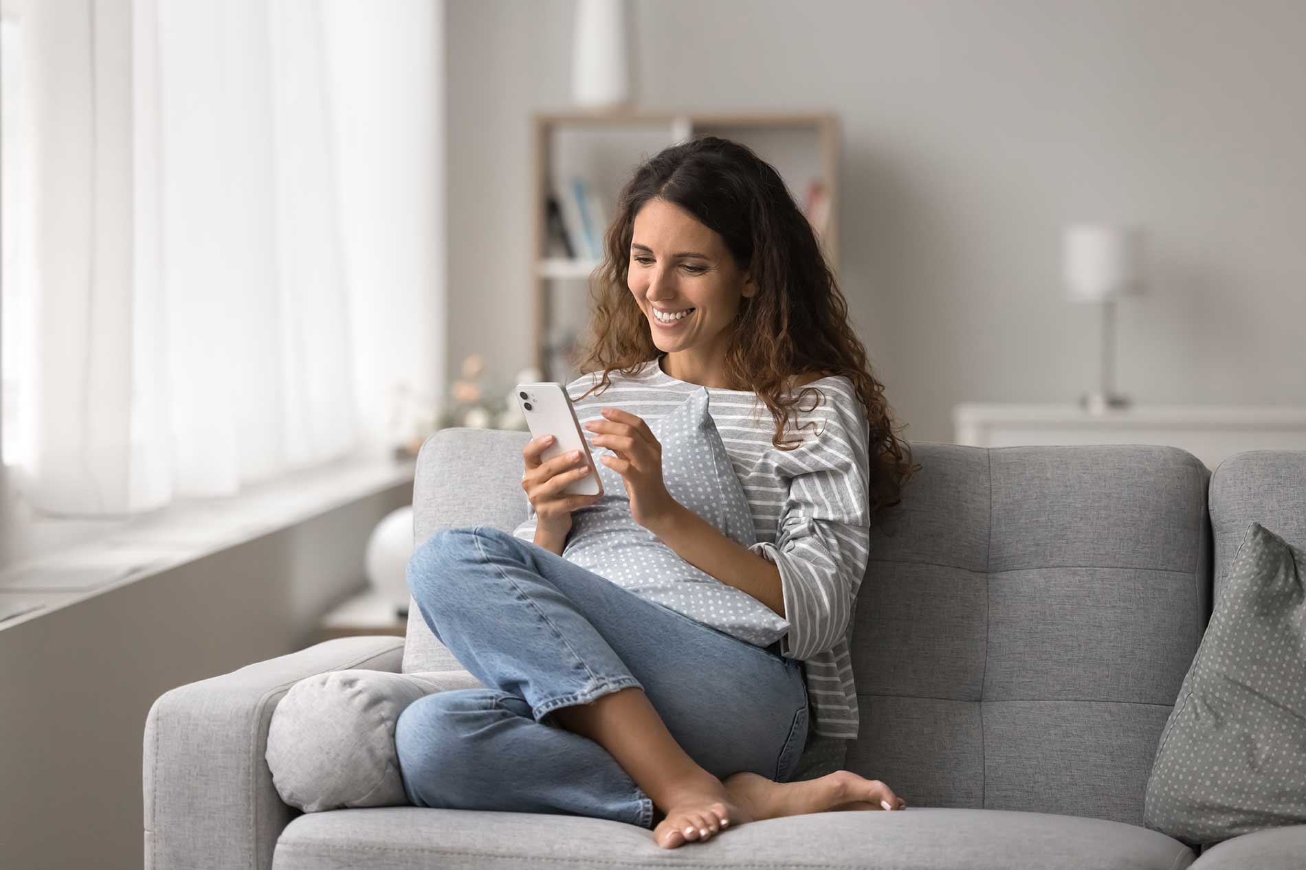 Stay Warm This Winter - Woman relaxing on the couch