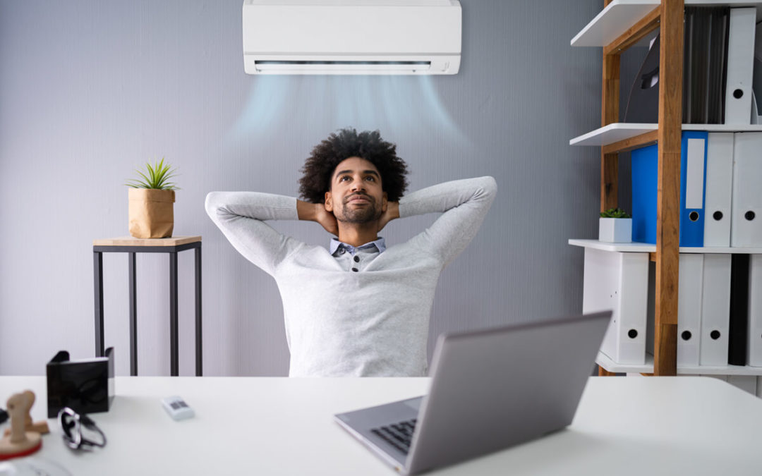 businessman working in office with air conditioning