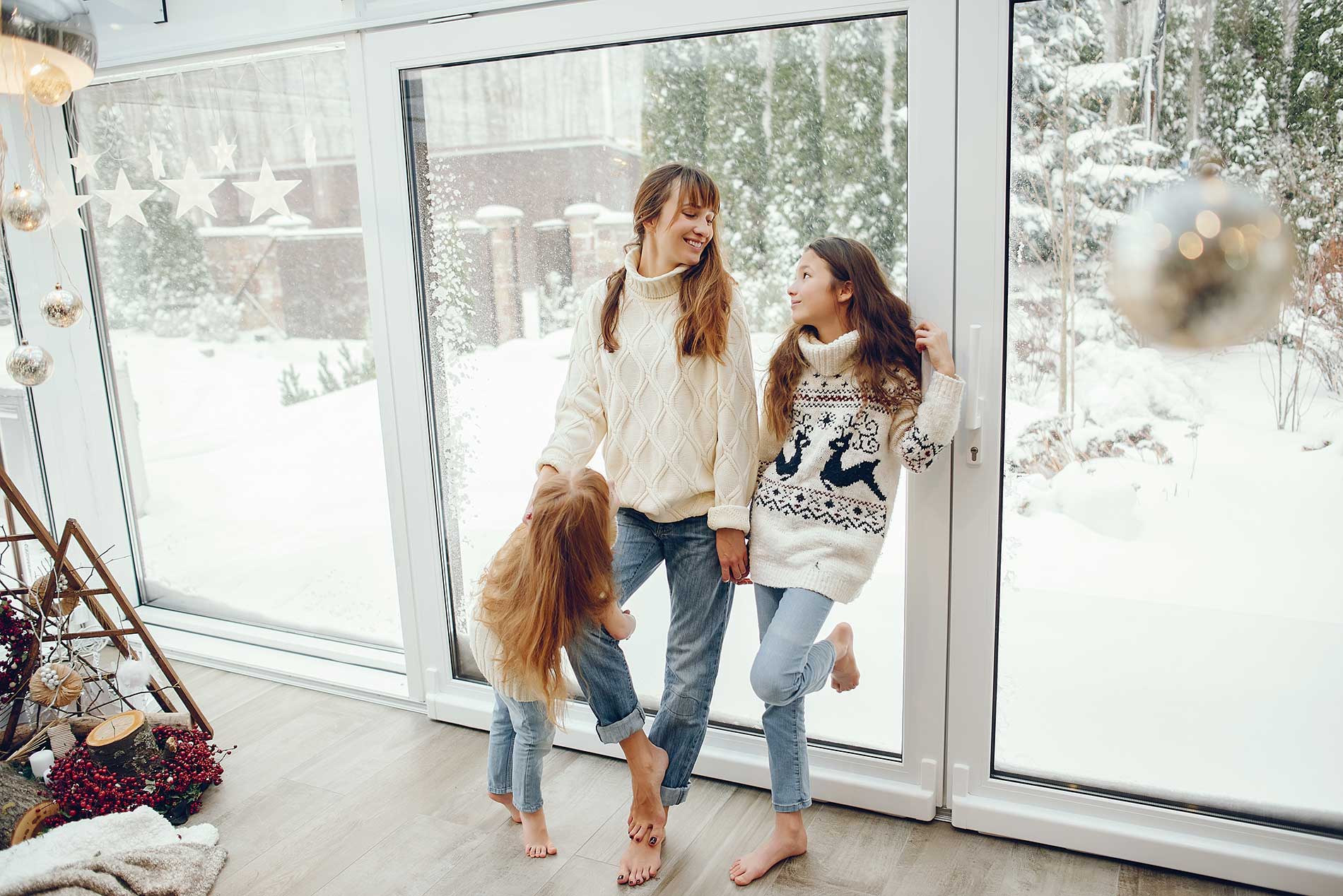 family indoors in a heated home during the winter