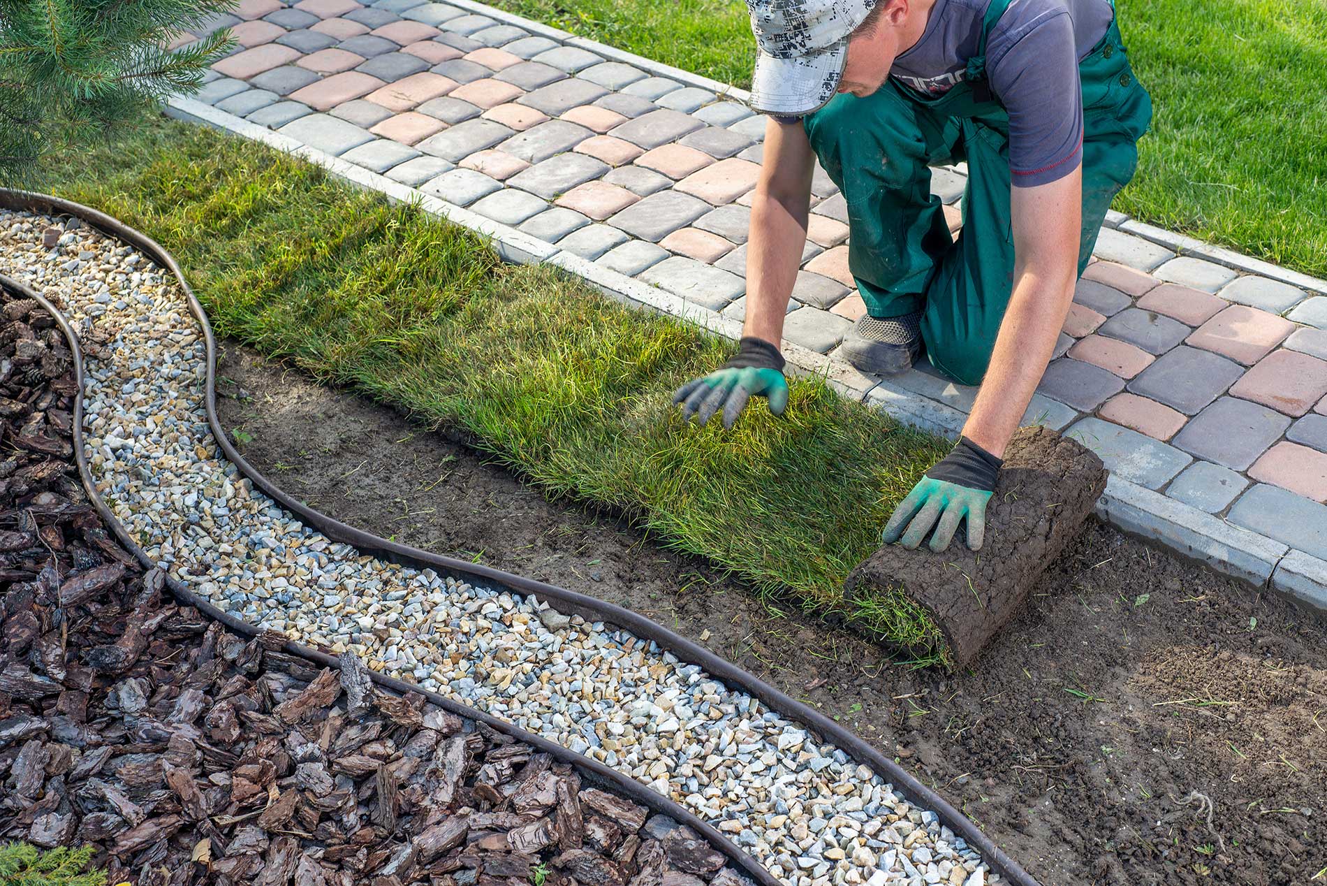 laying down artificial grass