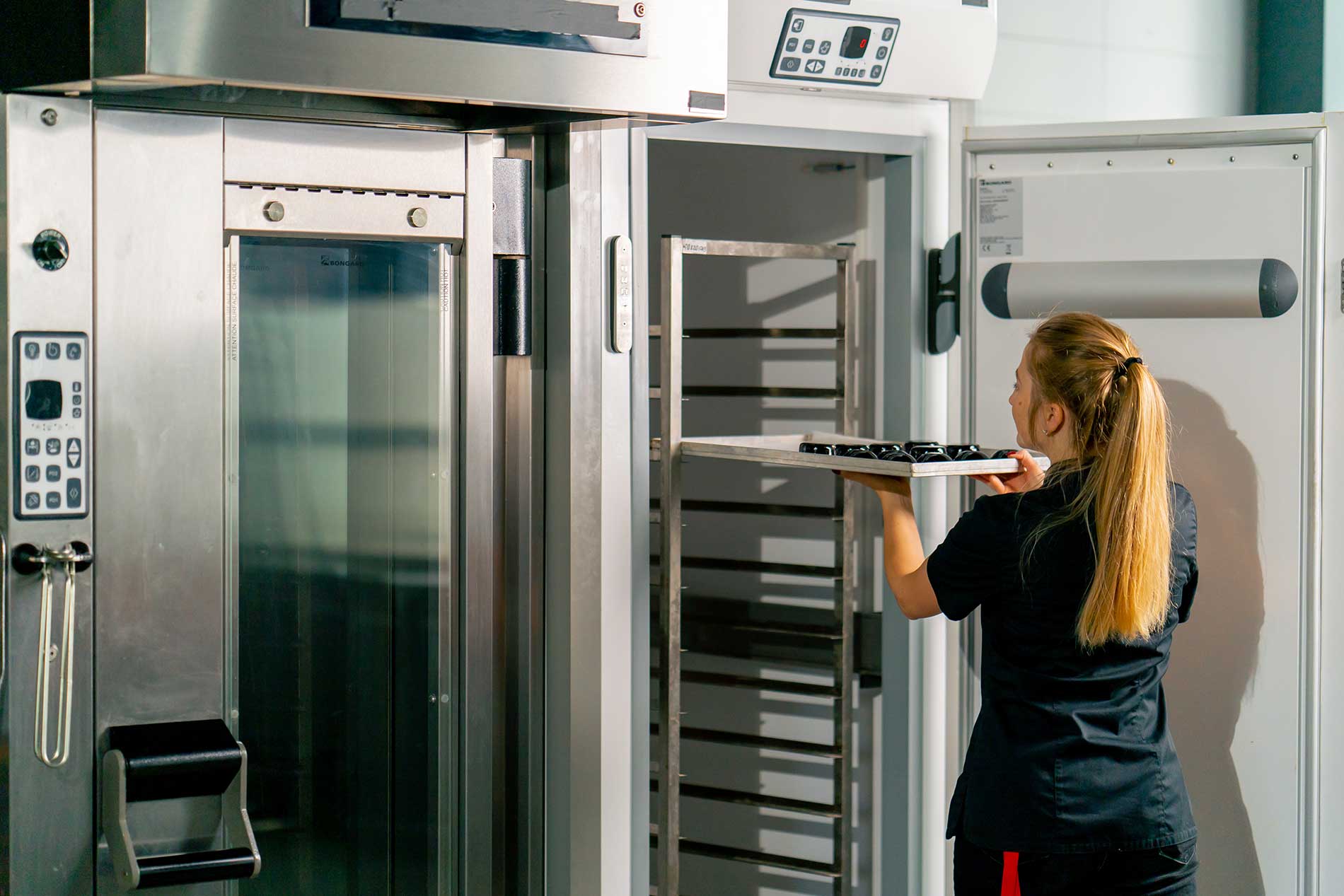 staff using a restaurant cooler for food