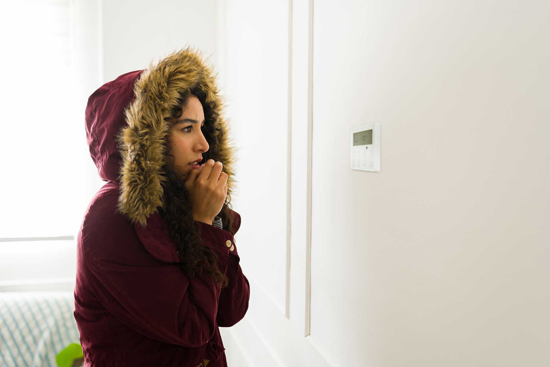 woman feeling cold in her home